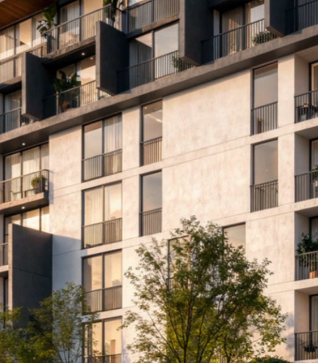 Fachada de Oxygen: balcones, celosías oscuras y volado de madera